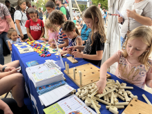 Fairgoers flooded the Grand Concourse to participate in hands-on STEM activities during STEM Day at the Fair.