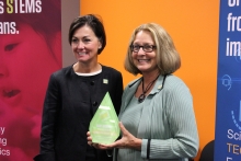 Iowa's STEM Council co-chair Mary Andringa is recognized by Lt. Gov. Kim Reynolds 