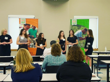 Students from Okoboji Middle School share about their workplace experiences, lessons and ambitions through the STEM BEST Program No Boundaries at the 25th STEM Advisory Council meeting at Accumold in Ankeny.